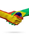 Flags Spain, Brazil countries, partnership friendship handshake concept.