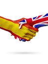 Flags Spain, United Kingdom countries, partnership friendship handshake concept.