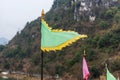 Flags at the stone wall of the ancient fortress in Qingyan Ancient Town, Guizhou province, China. The old town is a very famous