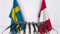 Flags of Sweden and Peru at international meeting or conference. 3D rendering