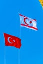 Flags of Turkey and Republic of Northern Cyprus waving between steeples of Selimiye mosque at Lefkosa, Cyprus Royalty Free Stock Photo