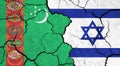 Flags of Turkmenistan and Israel on cracked surface