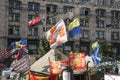 Flags of Ukraine and Banderites waiving over a tent of the Euromaidan barricades on Maidan square, during the end of revolution