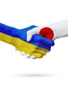 Flags Ukraine, Japan countries, partnership friendship handshake concept.