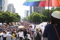 among flags, umbrellas and rainbow - coloured balloons the march with mines of people for LGBTTI pride in avenue of reform