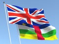 The flags of United Kingdom and Central African Republic on the blue sky. For news, reportage, business. 3d illustration