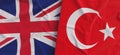 Flags of United Kingdom and Turkey. Linen flags close-up. Flag made of canvas. Great Britain. London. Turkish. National symbols.