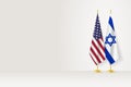 Flags of United States and Israel on flag stand, meeting between two countries Royalty Free Stock Photo