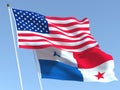 The flags of United States and Panama on the blue sky. For news, reportage, business. 3d illustration