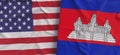 Flags of USA and Cambodia. Linen flag close-up. Flag made of canvas. United States of America. Cambodian. State national symbols.