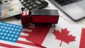 flags of the USA and Canada, dollars, charts Royalty Free Stock Photo