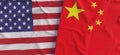 Flags of USA and China. Linen flags close-up. Flag made of canvas. United States of America. Chinese. State national symbols. 3d Royalty Free Stock Photo