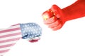 Flags of USA and China painted on two fists on white background. United States of America versus China trade war disputes