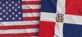 Flags of USA and the Dominican Republic. Linen flags close-up. Flag made of canvas. United States of America. Santo Domingo. State Royalty Free Stock Photo