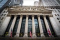 Flags of the usa and great britain on the facade of the new york stock exchange on wall street Royalty Free Stock Photo