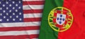 Flags of USA and Portugal. Linen flag close-up. Flag made of canvas. United States of America. Portuguese. State national symbols