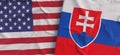 Flags of USA and Slovakia. Linen flags close-up. Flag made of canvas. United States of America. Bratislava State national symbols
