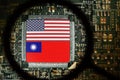 Flags of USA and Taiwan on a processor. Computer board with chip.