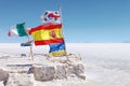 Flags in the Uyuni salt flats, plateau Bolivia