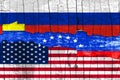 Flags of Venezuela, Russia and the USA on the background texture peeling paint with a crack