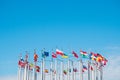 Flags of the world on flagpoles, copy space
