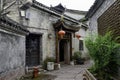 A flagstone alley leads through Asian-style buildings that make up Fengshuan Ancient City in Tibet, China