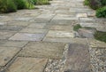 Flagstone patio walkway in Europe Royalty Free Stock Photo