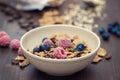 Flakes with berries in brown bowl Royalty Free Stock Photo