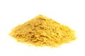 Flakes of Yellow Nutritional Yeast a Cheese Substitute and Seasoning for Vegan Diets Royalty Free Stock Photo