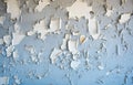 Flaking blue cracked paint on a wall Royalty Free Stock Photo
