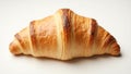 Flaky croissant on white surface Royalty Free Stock Photo