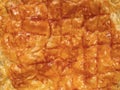 Flaky golden puff pastry pie crust food background Royalty Free Stock Photo