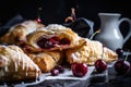 flaky puff pastry turnovers with cherry filling and sugar sprinkle on top