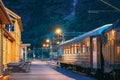 Flam, Norway. Famous Railroad Flamsbahn. Green Norwegian Train Near Railway Station. Electric trainFlam, Norway. Famous