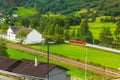 Flam, Norway red train tour in green valley Royalty Free Stock Photo