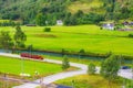 Flam, Norway red train tour in green valley Royalty Free Stock Photo