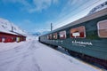 The train stops at the flam station. The Flam Line is between Myrdal and Flam in Aurland, Norway, the mainline of the Bergen Line. Royalty Free Stock Photo