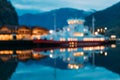 Flam, Norway. Touristic Ship Boat Moored Near Berth In Sognefjord Port. Summer Evening. Abstract Boke Bokeh Background Royalty Free Stock Photo