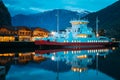 Flam, Norway. Touristic Ship Boat Moored Near Berth In Sognefjord Port. Summer Night. Norwegian Longest And Deepest Royalty Free Stock Photo