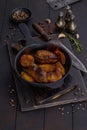 Flambe to pork with peach in pan