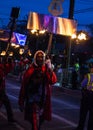 A Flambeau Carrier Marches in the Orpheus Parade Royalty Free Stock Photo