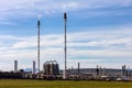 Fuel refinery with chimney and furnace.  Blue sky overhead Royalty Free Stock Photo