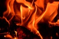 Flame of burning firewood as a background. Royalty Free Stock Photo