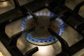 A flame burning on a gas stove in the kitchen Royalty Free Stock Photo