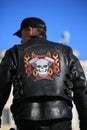 Flame, cross and skull. Applique on biker vest. Back view Royalty Free Stock Photo