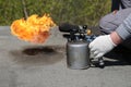 flame escapes from the nozzle of the gasoline burner