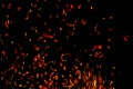 Fire flames with sparks on a black background Royalty Free Stock Photo