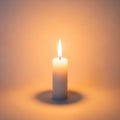 Flame flickers softly, producing a small halo of light around Royalty Free Stock Photo
