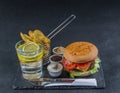 Flame grilled double stack cheeseburger, lettuce, tomato, with t