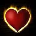 Flame heart on the dark Royalty Free Stock Photo